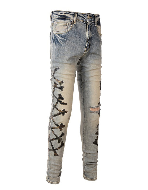 Load image into Gallery viewer, Men&#39;s Fashion Holes Bone Pattern Leather Stretch Skinny Jeans
